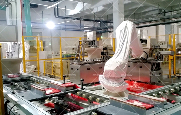 新松携手九牧打造国际上首条机器人自动施釉生产线